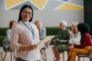 happy asian woman looking at camera while visiting
