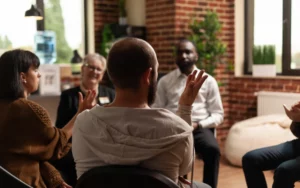 person sharing achievement with group of people