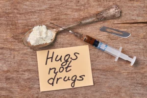 rusty spoon with white drugs