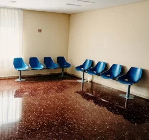 waiting room in a hospital with empty chairs